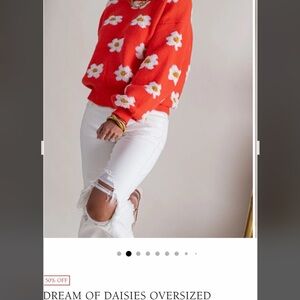 Women’s Pol brand pull over. Orange with daisies.